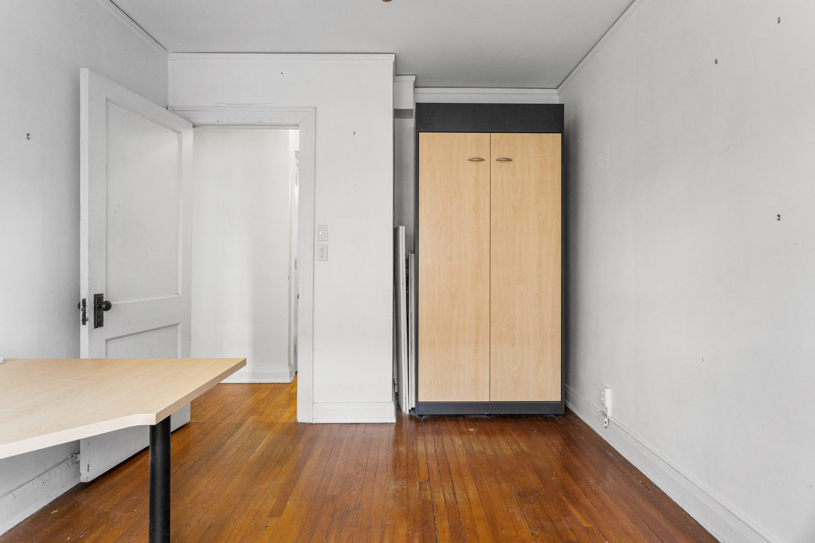 307 North Prairie Street, Unit 3 Champaign, IL 61820 - Photo 26 of 34 a view of a room with wooden floor