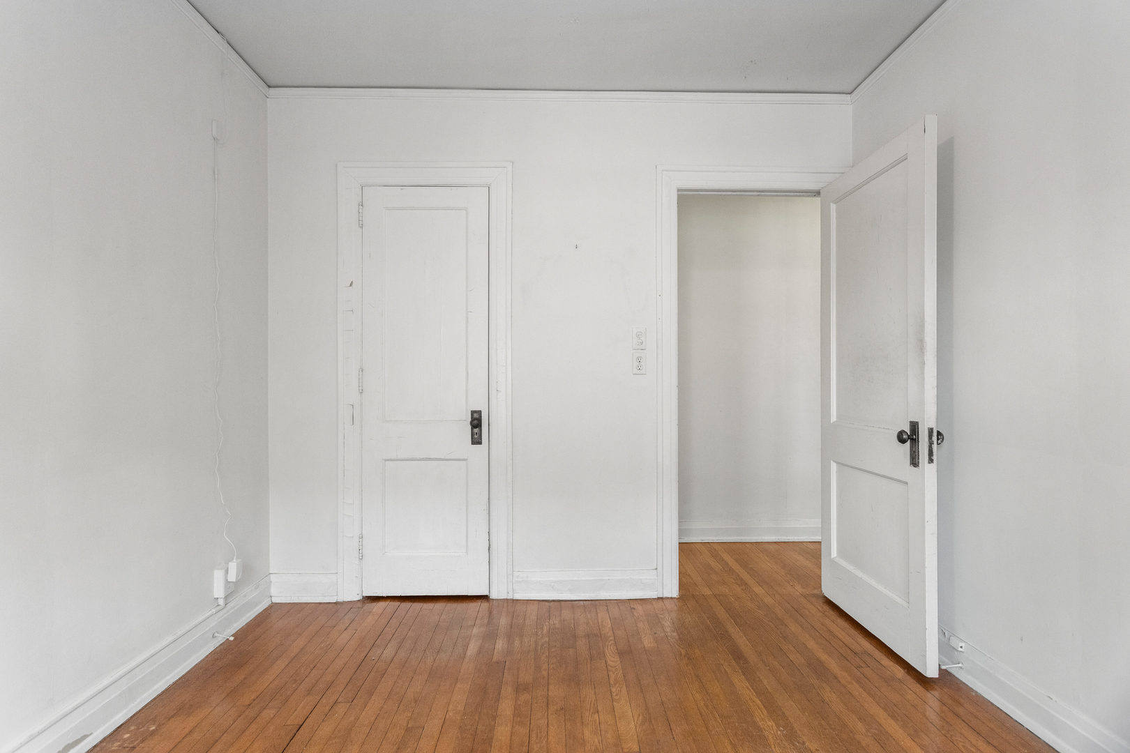 307 North Prairie Street, Unit 3 Champaign, IL 61820 - Photo 29 of 34 a view of a room with wooden floor
