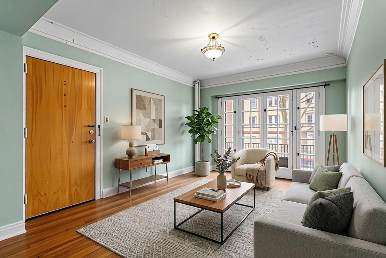 307 North Prairie Street, Unit 3 Champaign, IL 61820 - Photo 3 of 34 a living room with furniture and a window