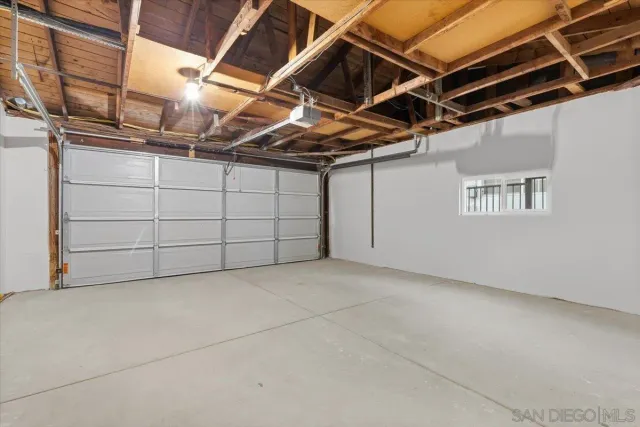 a view of a room with wooden walls