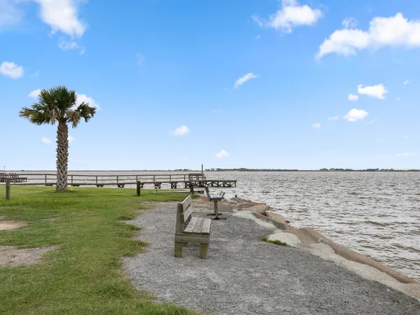 a view of a golf course with a lake