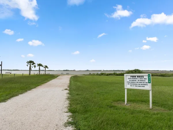 a view of a park with swings