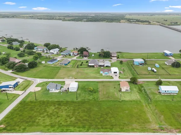 a view of a lake with a houses