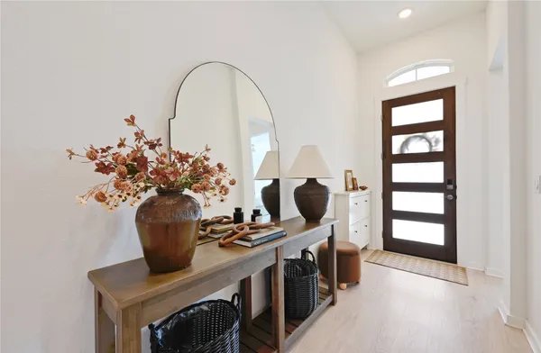 a vase of flowers sitting on a table