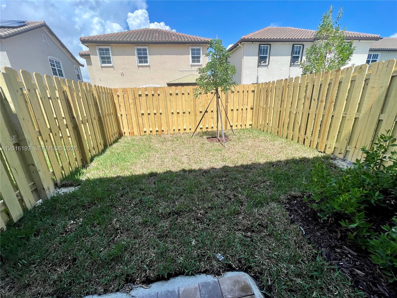 11737 Southwest 245 Terrace Homestead, FL 33032 - Photo 7 of 16 a view of backyard of house