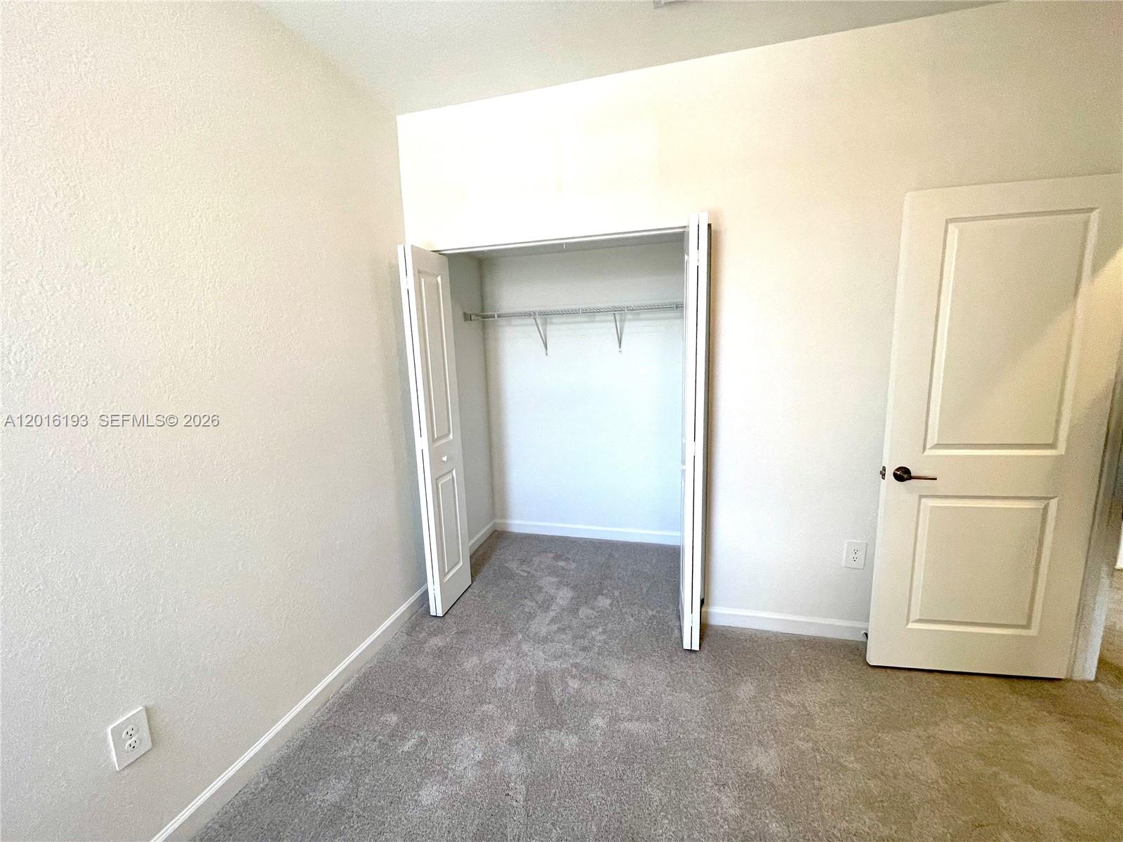 11737 Southwest 245 Terrace Homestead, FL 33032 - Photo 10 of 16 a view of an empty room