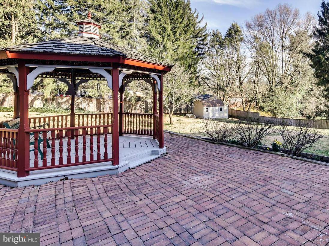 3909 Chatham Road Ellicott City, MD 21042 - Photo 26 of 30 Fenced-in Yard with Gazebo, Patio