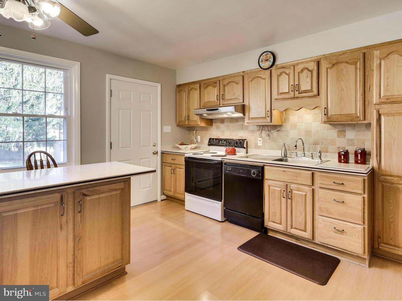 3909 Chatham Road Ellicott City, MD 21042 - Photo 10 of 30 Kitchen with Corian Countertops