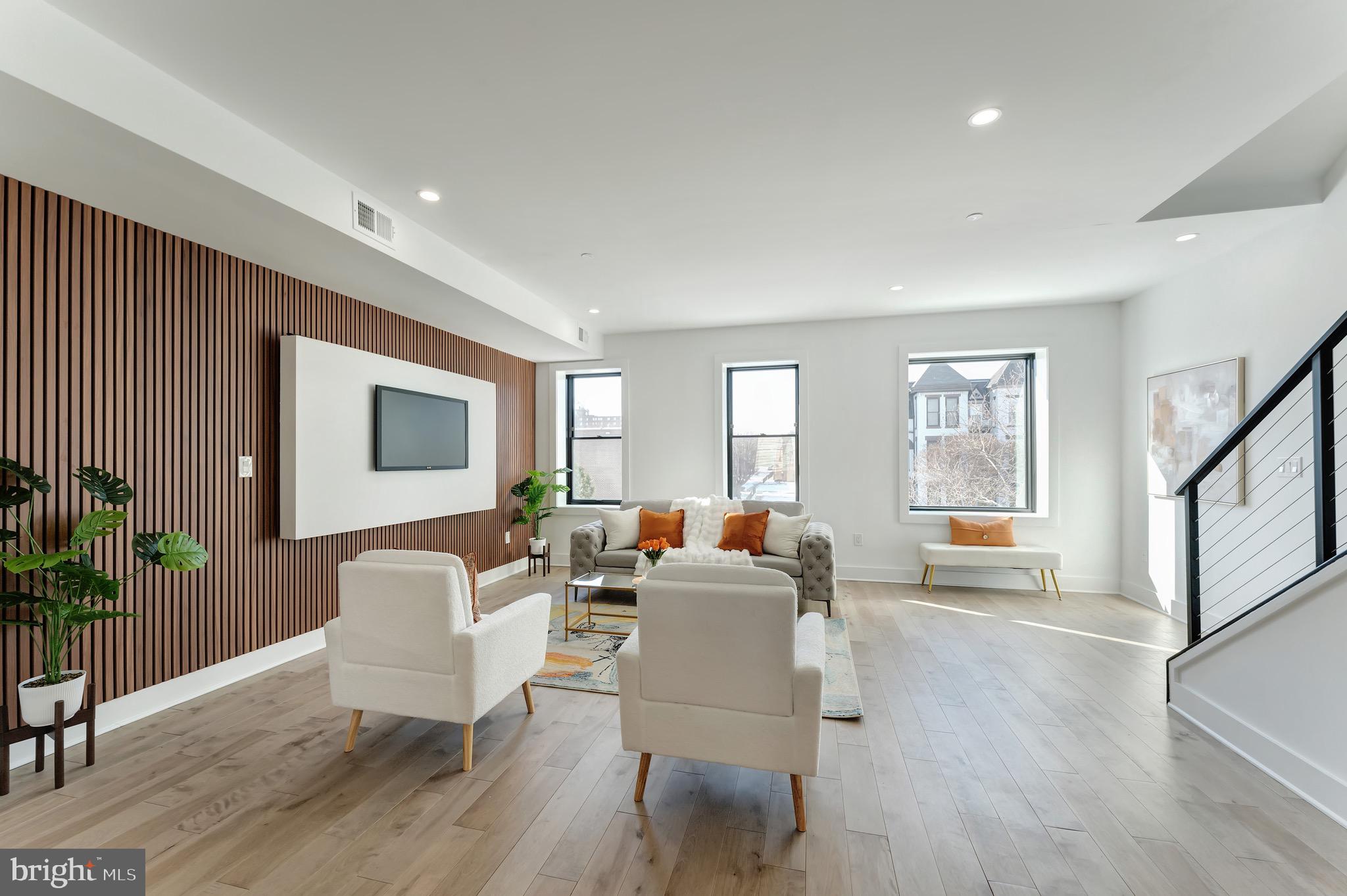 3009 13th Street Northwest, Unit 2 Washington, DC 20009 - Photo 6 of 44 a living room with furniture or wooden floor and a window