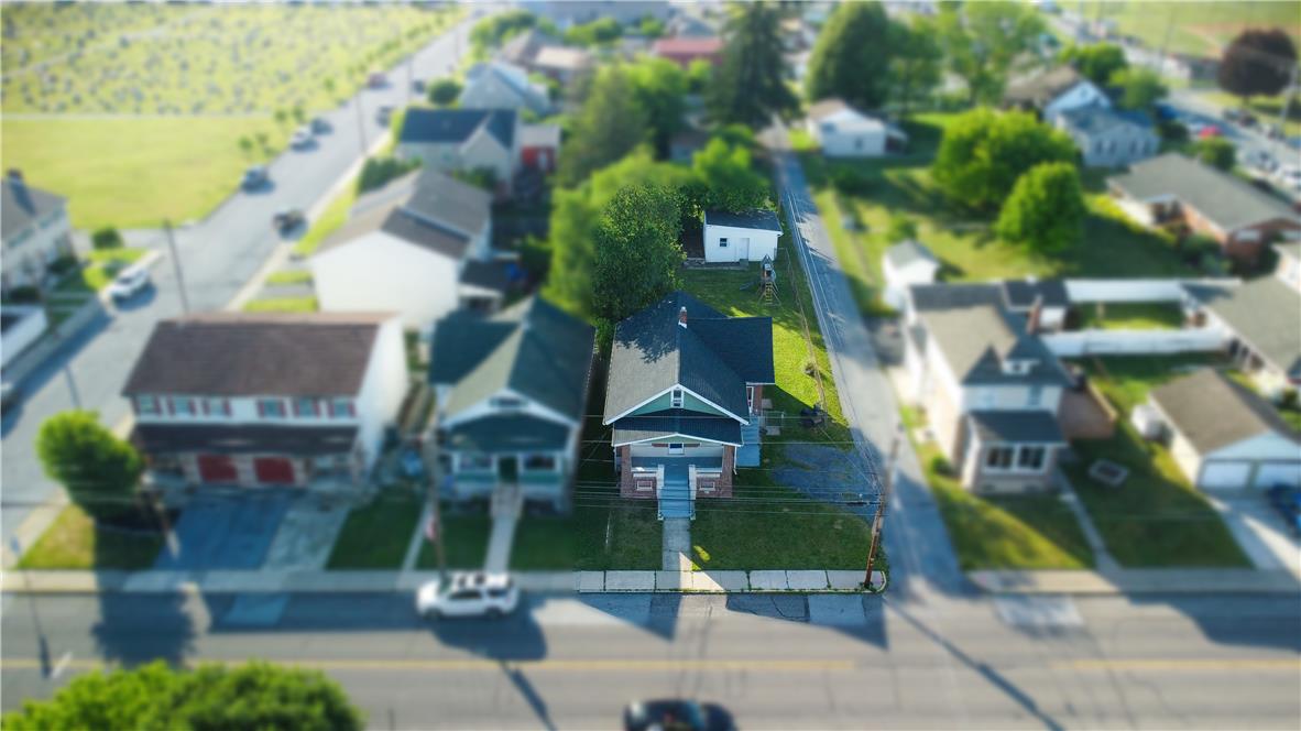 870 Chestnut Street Coplay, PA 18037 - Photo 23 of 24 An aerial perspective reveals a charming home with well-maintained front landscaping and surrounding neighborhood views.