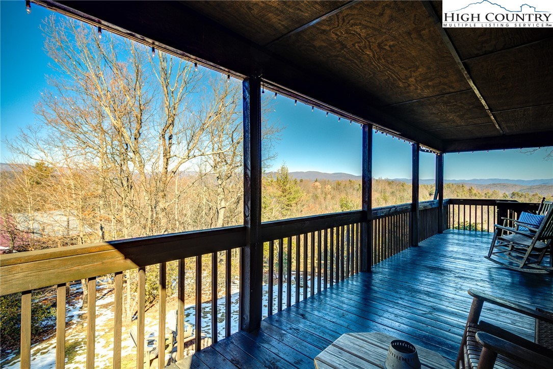 1643 Buck Mountain Road Purlear, NC 28665 - Photo 12 of 33 a view of porch with wooden floor
