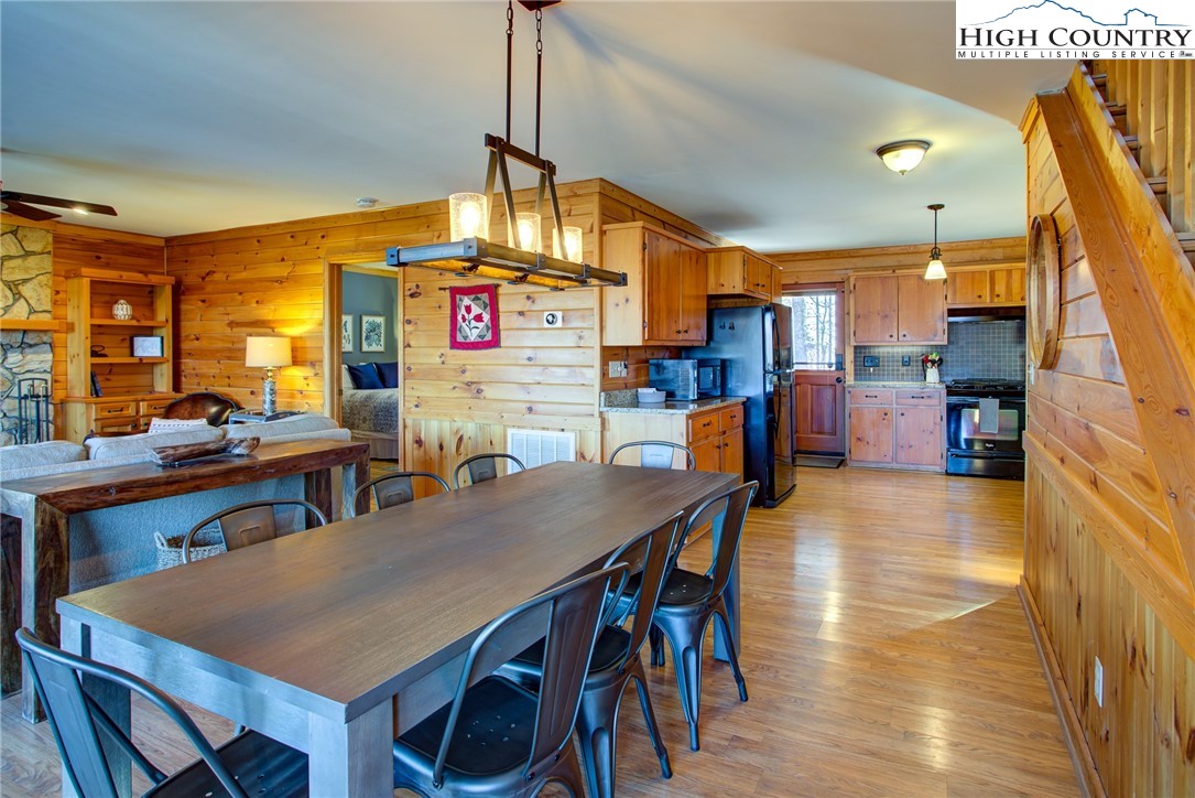1643 Buck Mountain Road Purlear, NC 28665 - Photo 6 of 33 a view of a dining room with furniture