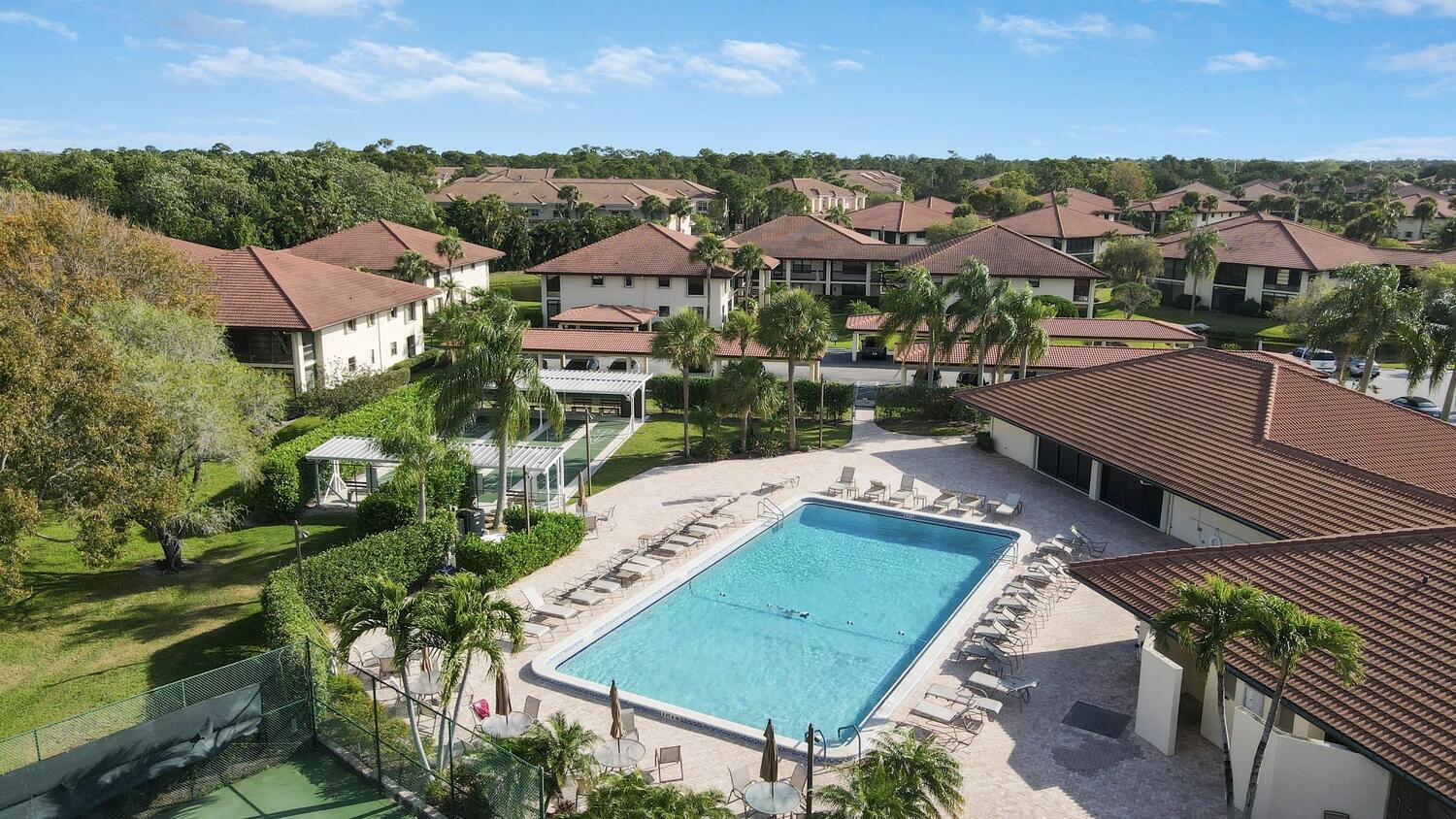 540 Southwest South River Drive, Unit 204 Stuart, FL 34997 - Photo 11 of 14 an aerial view of a house with a garden