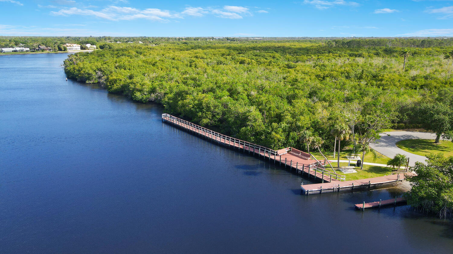 540 Southwest South River Drive, Unit 204 Stuart, FL 34997 - Photo 14 of 14 a view of a lake with a mountain