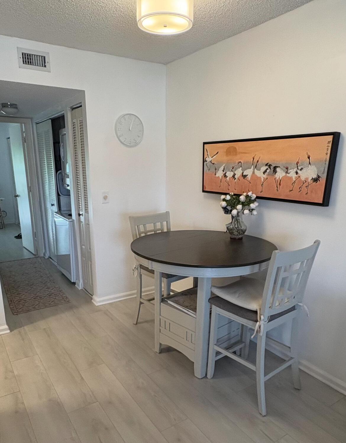540 Southwest South River Drive, Unit 204 Stuart, FL 34997 - Photo 6 of 14 a view of a table and chairs in a room