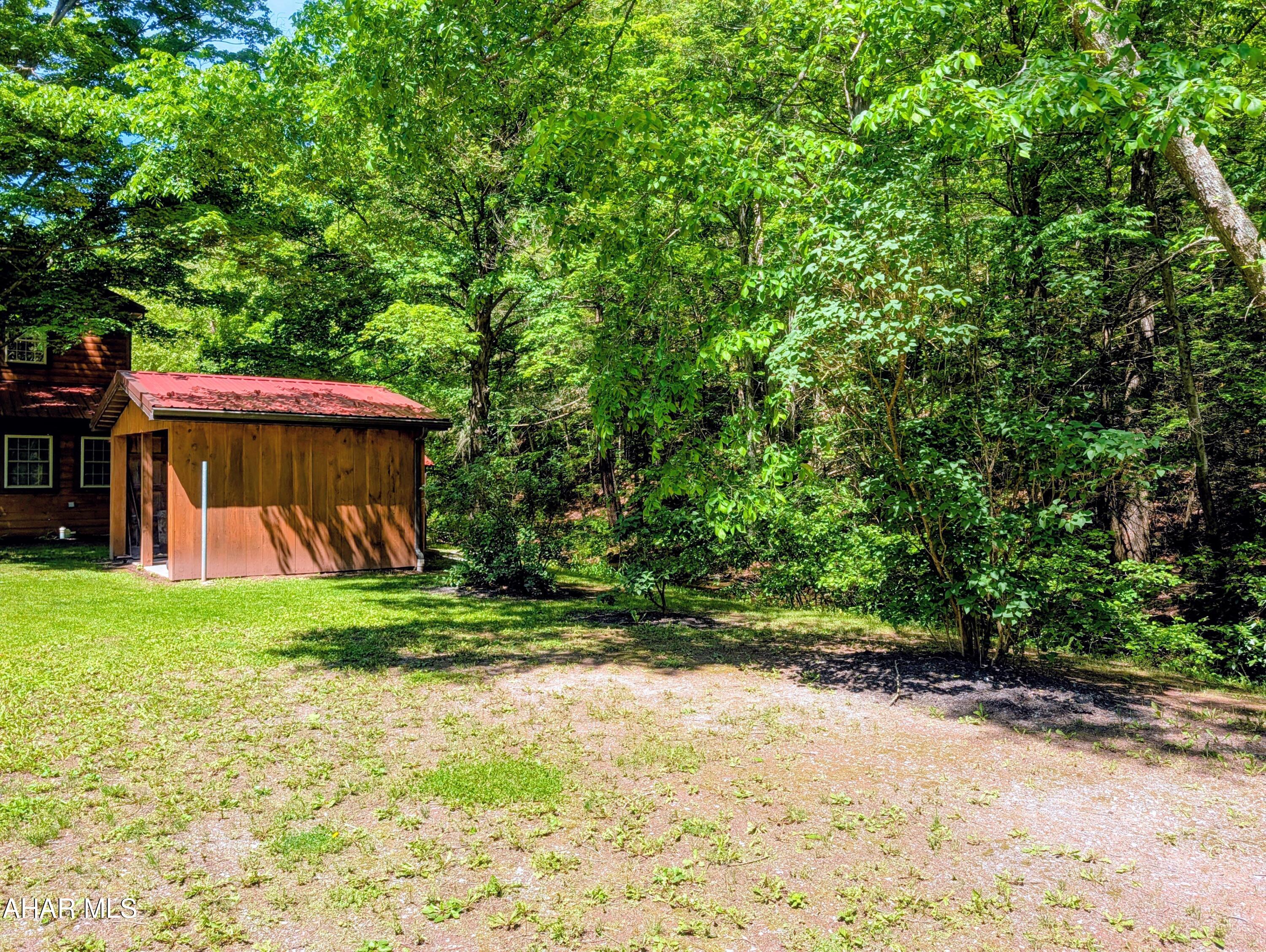 213 Sherman Valley Road Hopewell, PA 16650 - Photo 82 of 104 a view of a back yard of the house