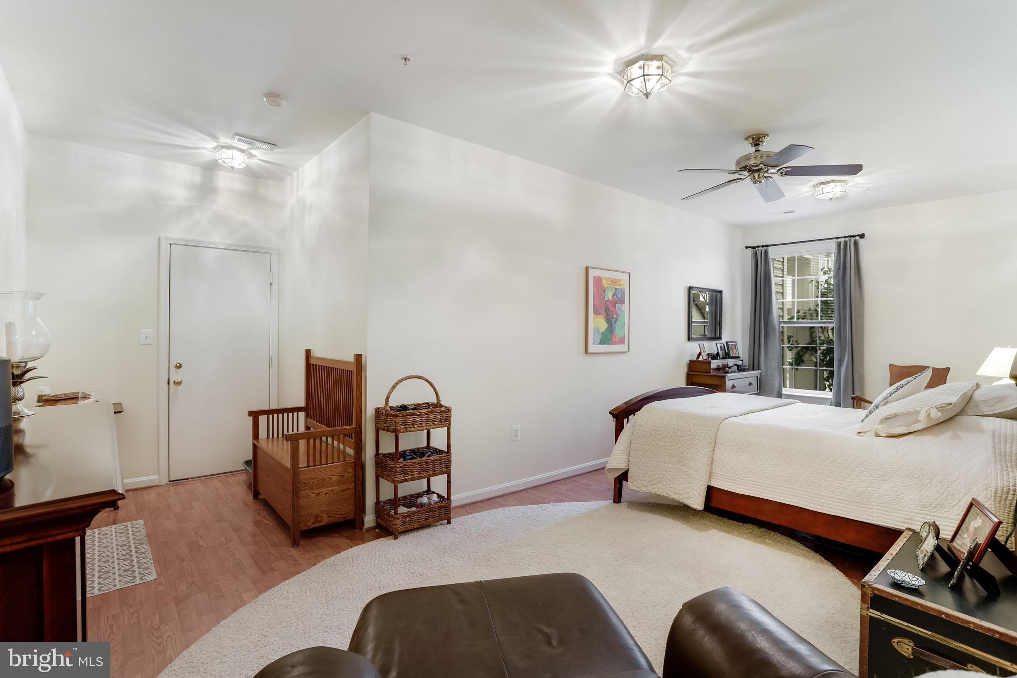 11402 Gate Hill Place, Unit 60 Reston, VA 20194 - Photo 23 of 27 Lower Level, currently furnished as a guest room.