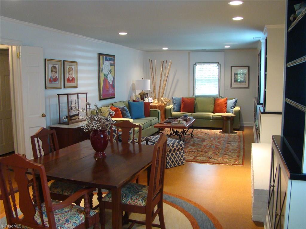 3614 Pinetop Road Greensboro, NC 27410 - Photo 20 of 30 Lower level den has enough space for relaxing, playing cards, and a home office!