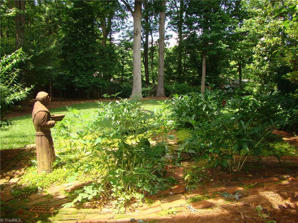3614 Pinetop Road Greensboro, NC 27410 - Photo 24 of 30 This beautiful view is what you are greeted with when exiting from the lower level.