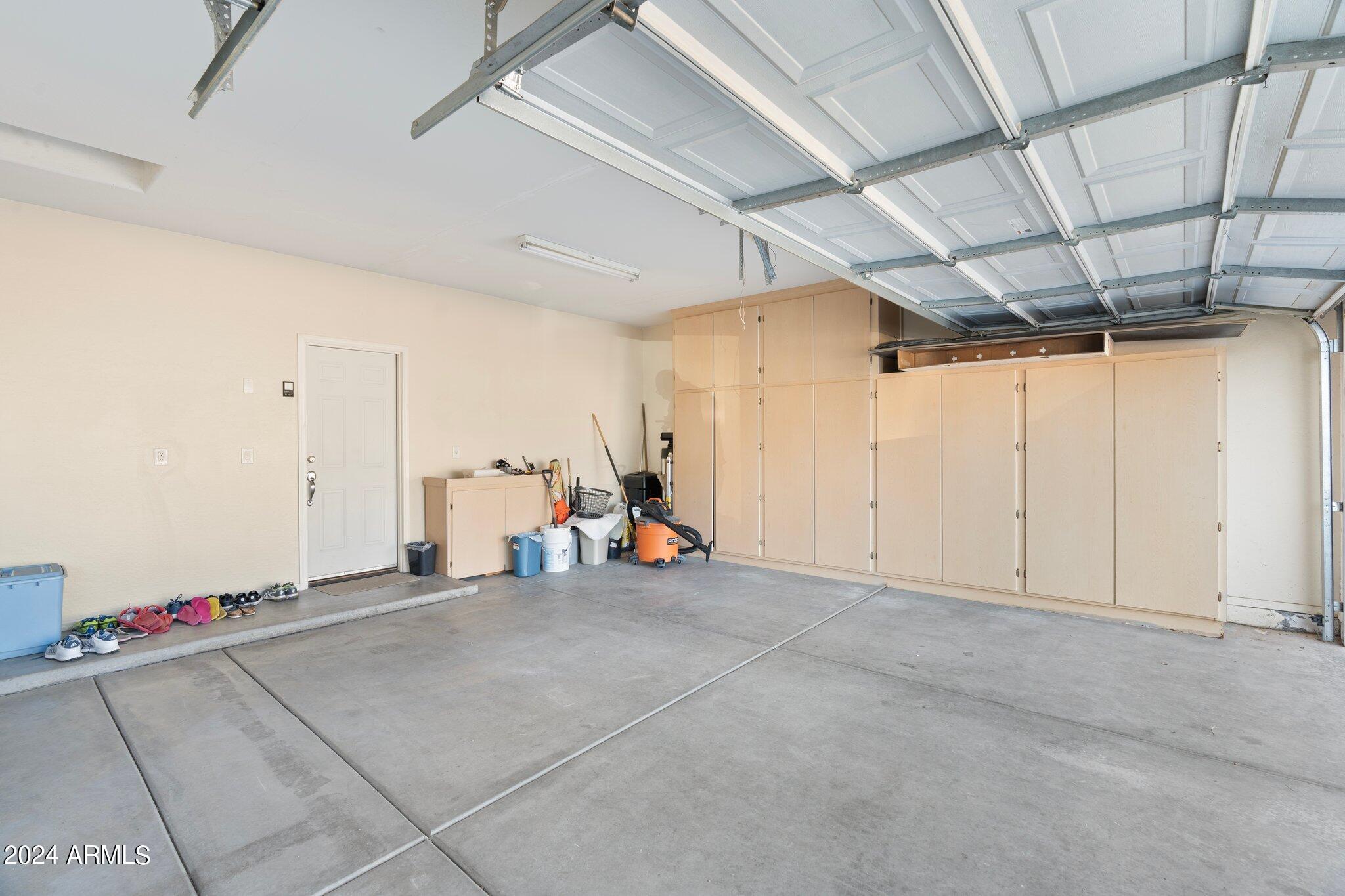 4427 West Summerside Road Laveen, AZ 85339 - Photo 19 of 72 a view of a room with gym equipment