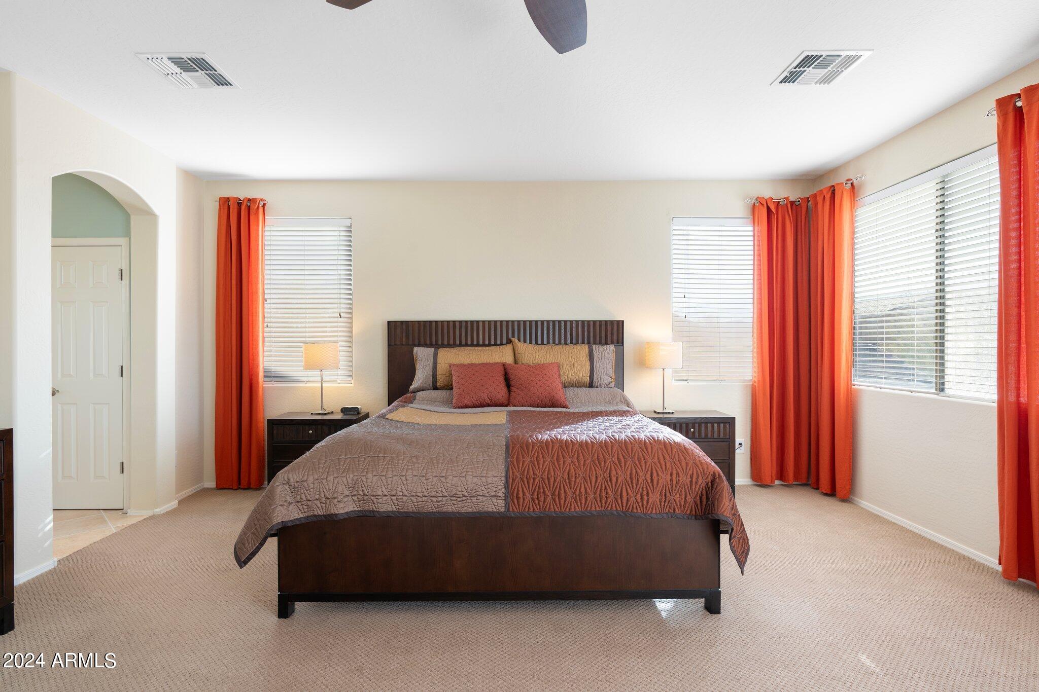 4427 West Summerside Road Laveen, AZ 85339 - Photo 35 of 72 a bedroom with a bed and a window