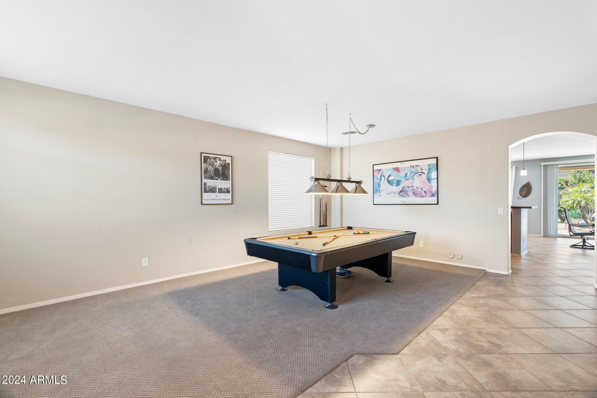 4427 West Summerside Road Laveen, AZ 85339 - Photo 49 of 72 a living room with furniture and a table