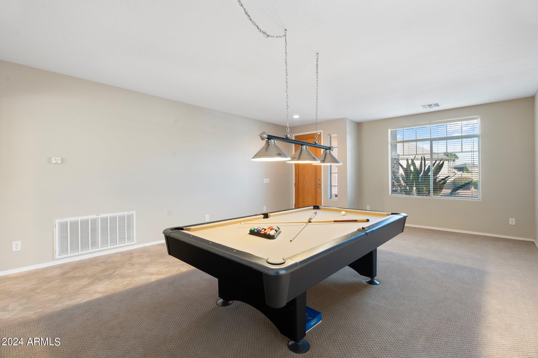 4427 West Summerside Road Laveen, AZ 85339 - Photo 50 of 72 a room with pool table and windows