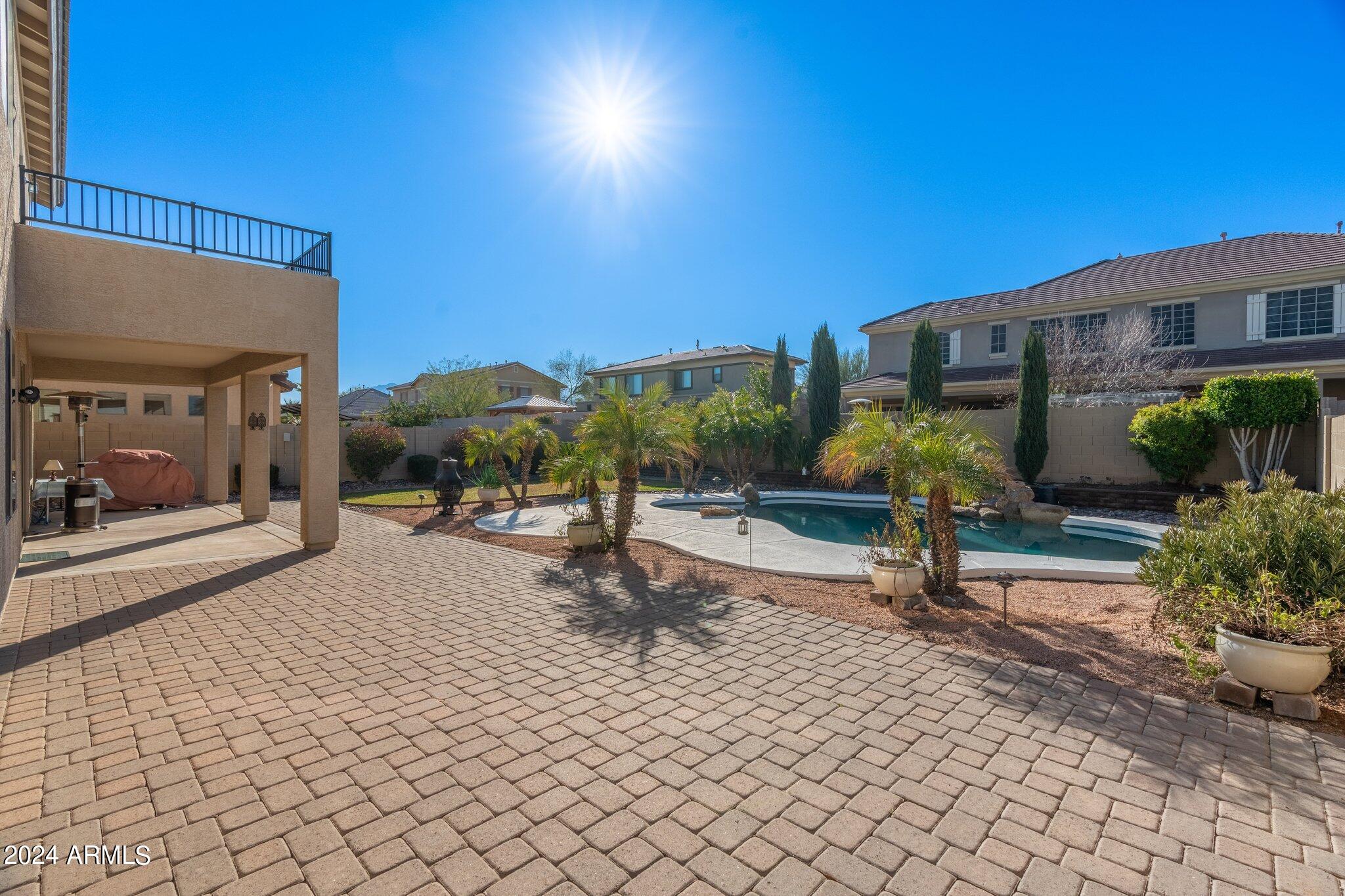 4427 West Summerside Road Laveen, AZ 85339 - Photo 68 of 72 a view of a house with backyard and sitting area