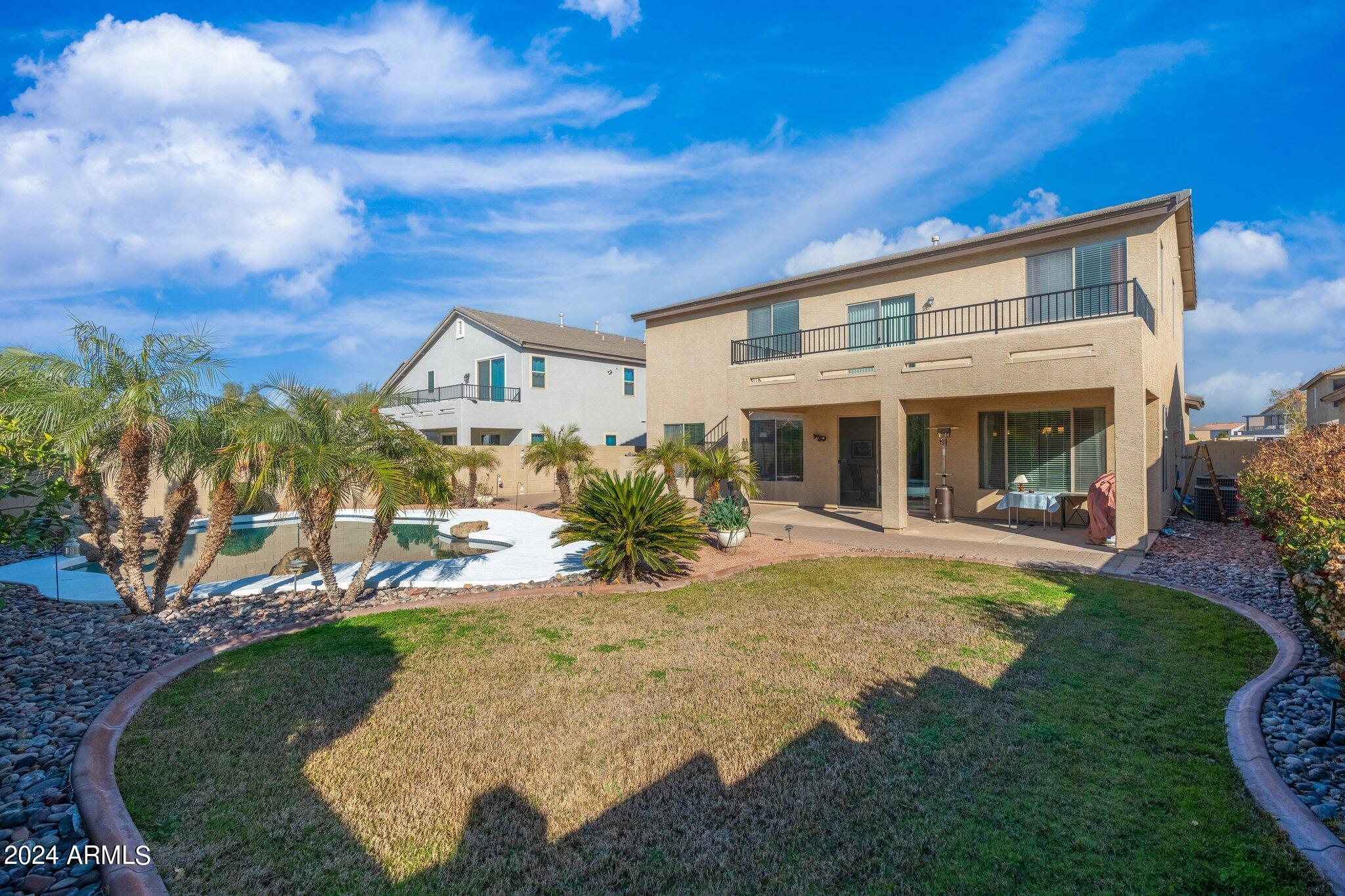 4427 West Summerside Road Laveen, AZ 85339 - Photo 72 of 72 front view of a house with a yard