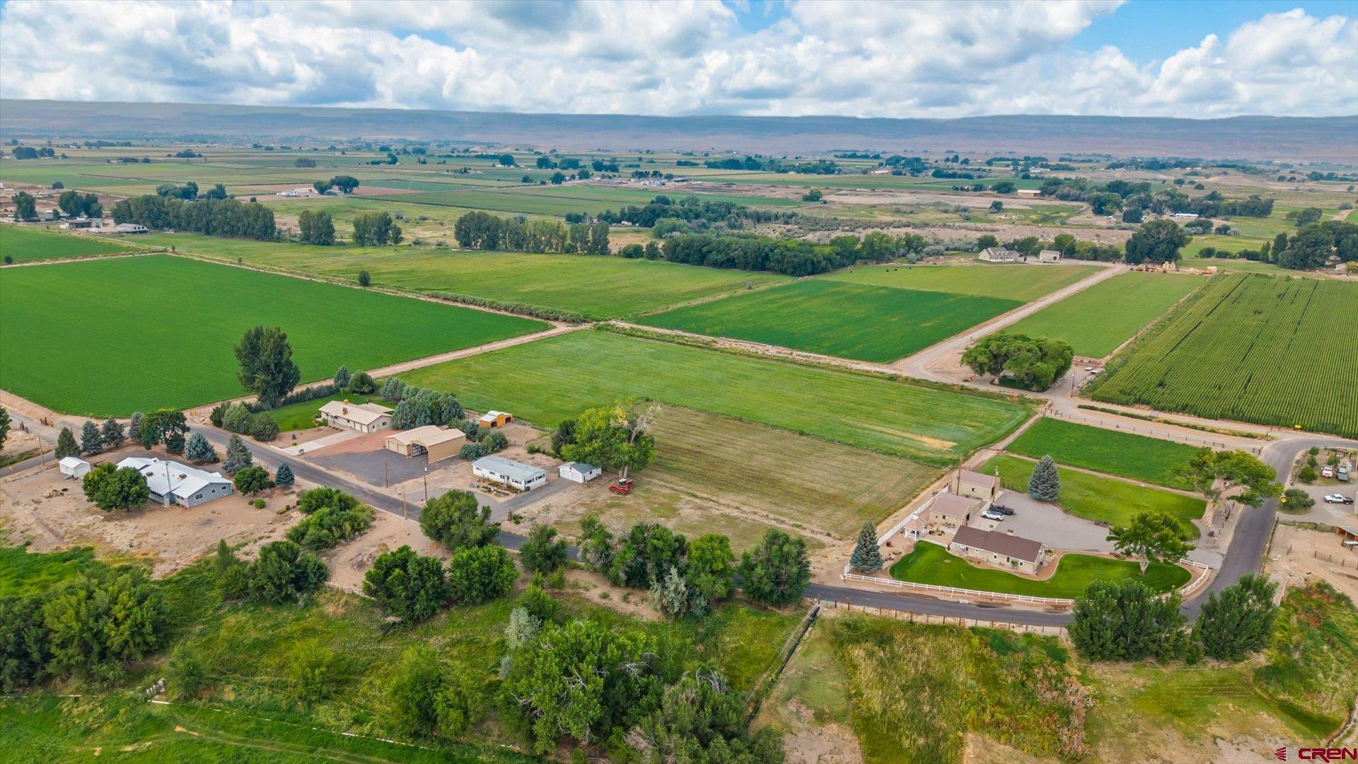 14860 Deer Run Road Delta, CO 81416 - Photo 32 of 33 an aerial view of a house with outdoor space and street view