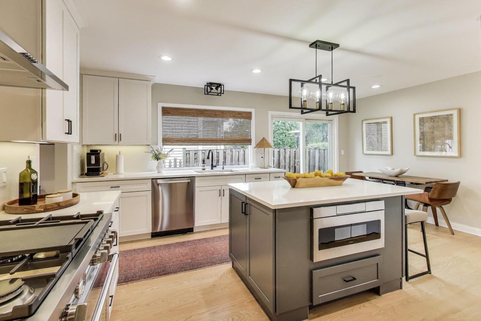 2811 Farmington Road Northbrook, IL 60062 - Photo 15 of 45 a kitchen with a stove stainless steel appliances granite countertop a stove and a sink