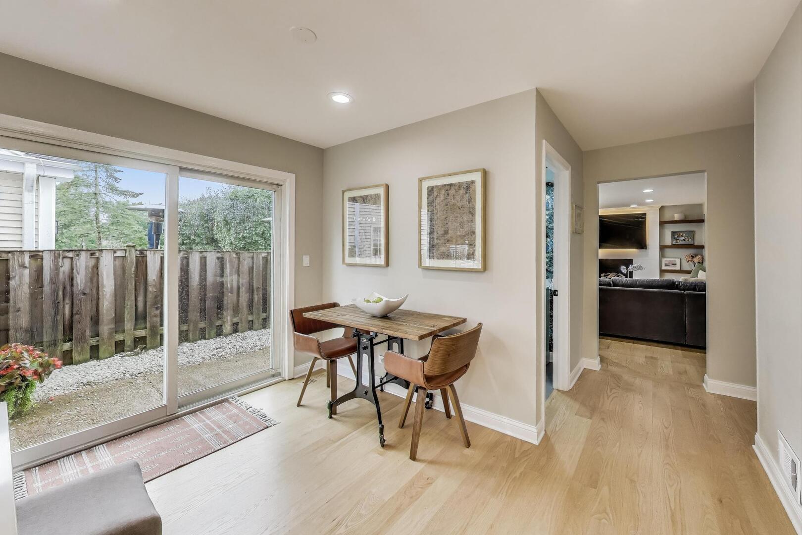 2811 Farmington Road Northbrook, IL 60062 - Photo 16 of 45 a view of a dining room with furniture and wooden floor
