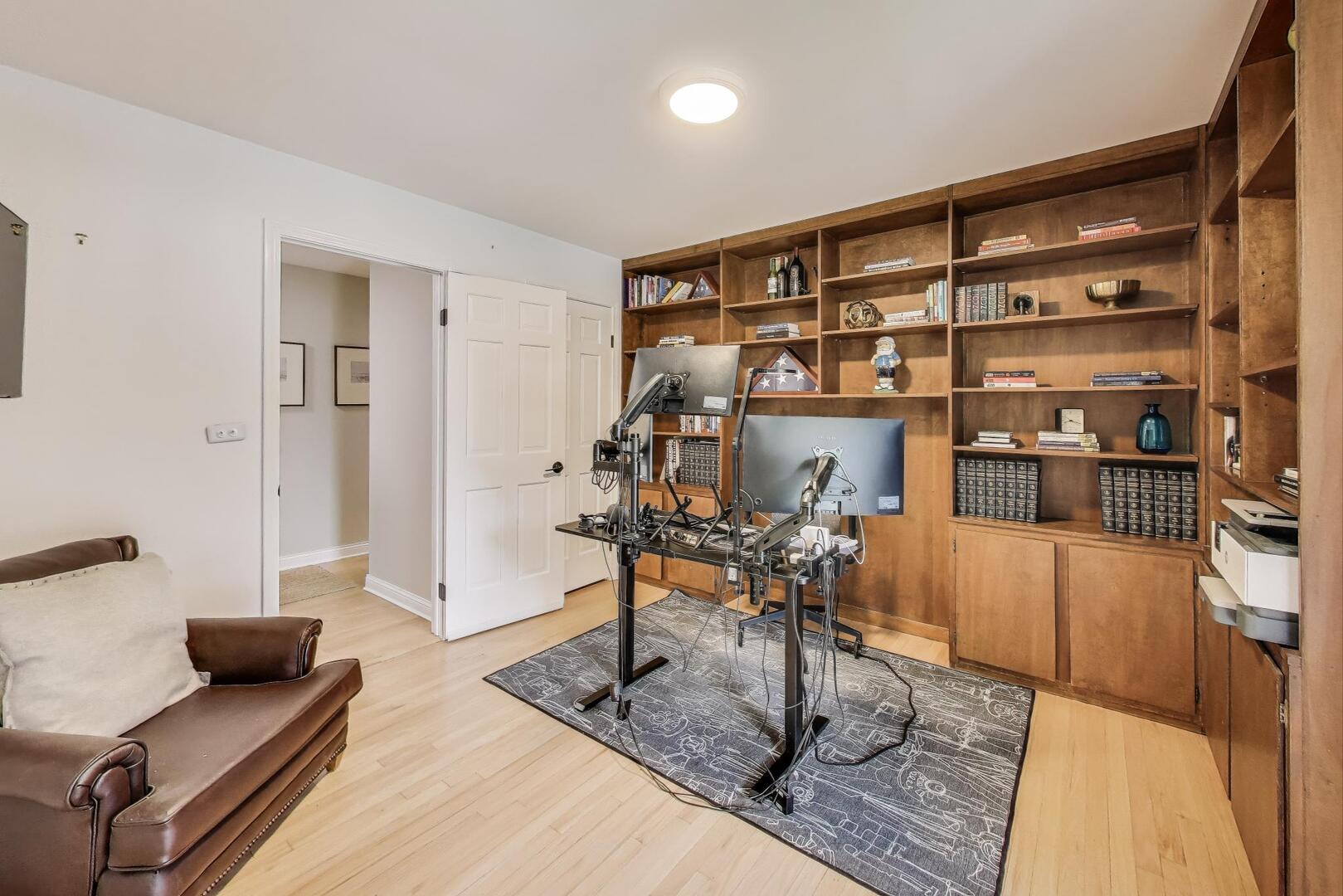 2811 Farmington Road Northbrook, IL 60062 - Photo 32 of 45 a living room with furniture and a couch