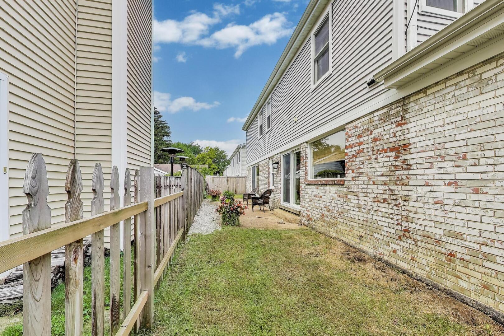 2811 Farmington Road Northbrook, IL 60062 - Photo 43 of 45 a view of a porch with wooden stairs
