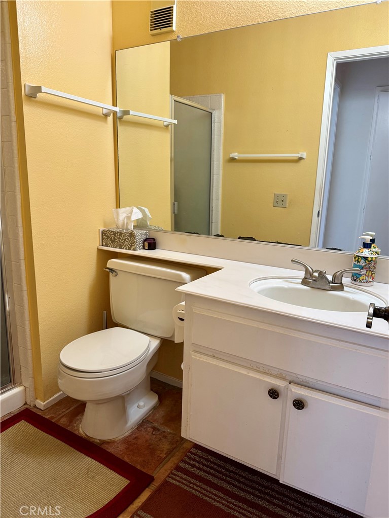 8 Coldstream Irvine, CA 92604 - Photo 14 of 27 a bathroom with a sink and a toilet