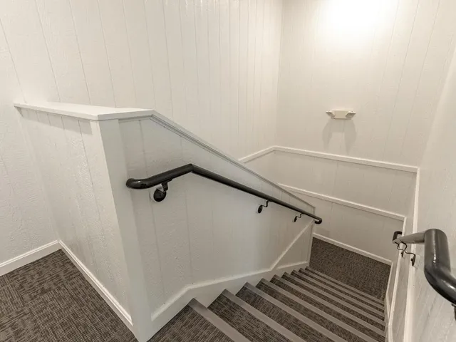 a view of a house with a street