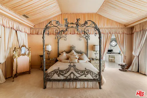 a view of a room with rack on the wall