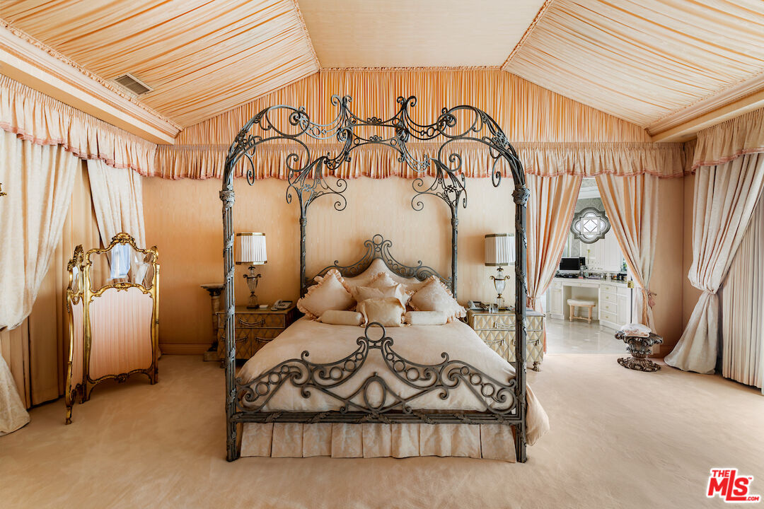 10275 Century Woods Drive Los Angeles, CA 90067 - Photo 21 of 42 a view of a room with rack on the wall