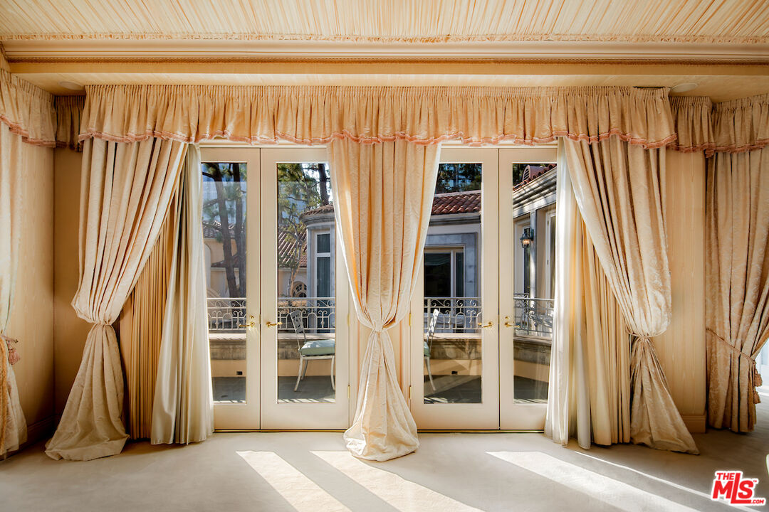 10275 Century Woods Drive Los Angeles, CA 90067 - Photo 24 of 42 a front view of a building with entryway