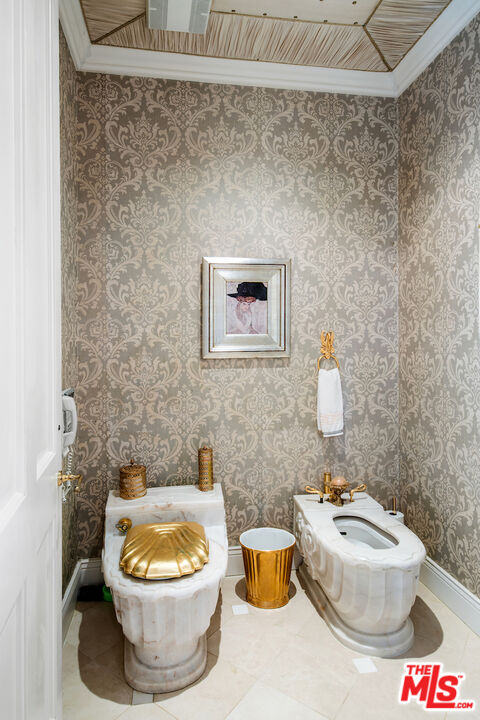 10275 Century Woods Drive Los Angeles, CA 90067 - Photo 29 of 42 a bathroom with a toilet and a sink