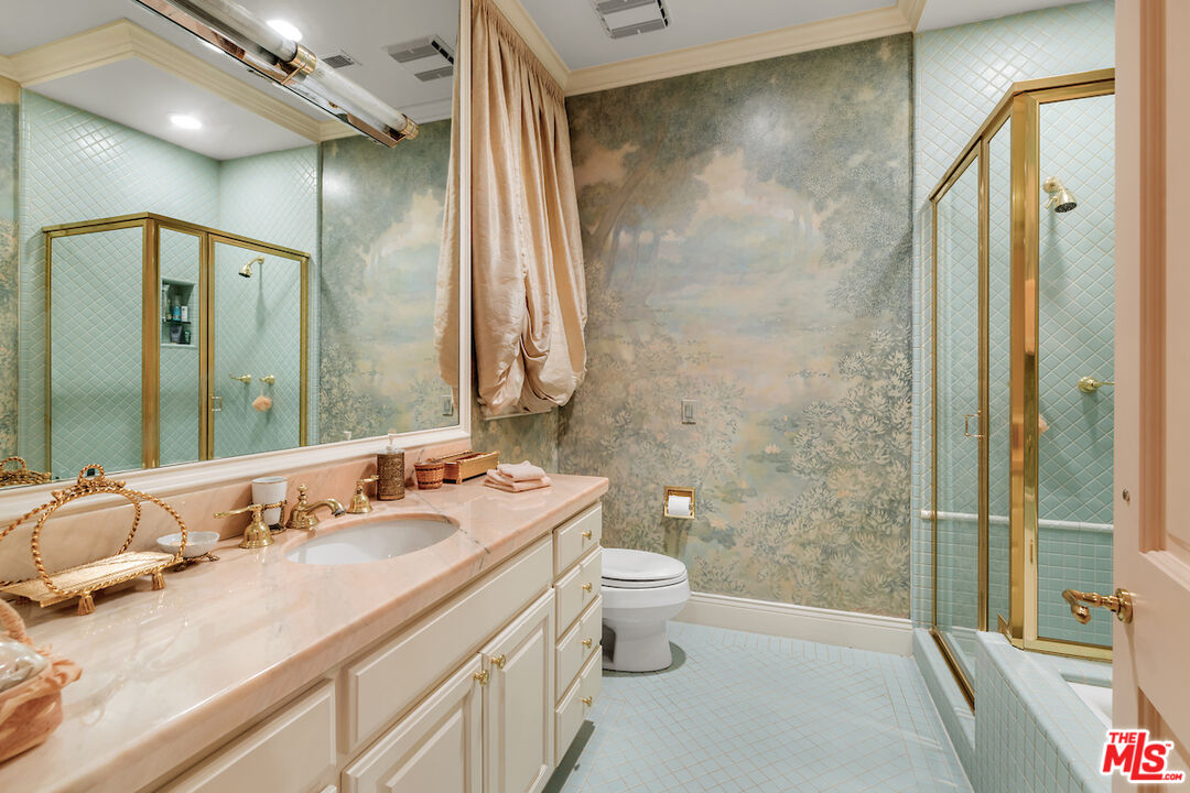 10275 Century Woods Drive Los Angeles, CA 90067 - Photo 35 of 42 a bathroom with a granite countertop sink toilet and shower