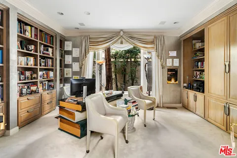 a kitchen with appliances and cabinets