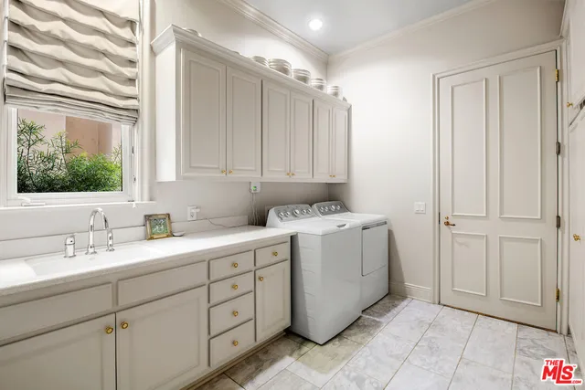 a bathroom with a sink a mirror and a shower