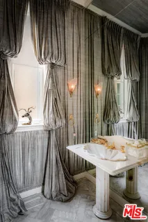 a view of towel hanging in the wooden wall