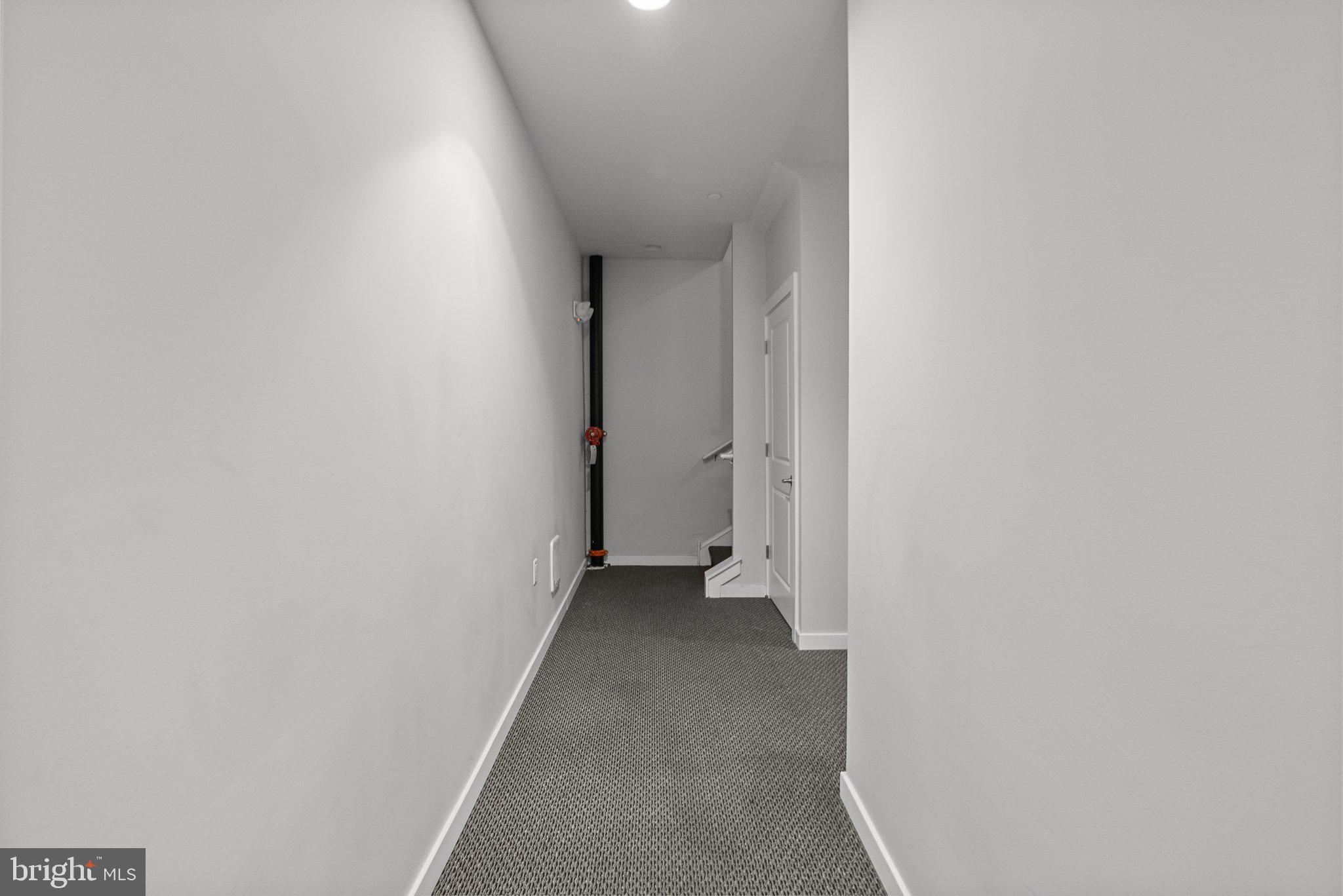1608 Ridge Avenue, Unit 302 Philadelphia, PA 19130 - Photo 23 of 24 a view of a room with a hallway
