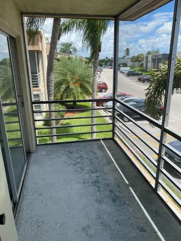 a view of a street with wooden stairs