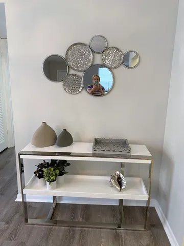 a view of a hallway with washer and dryer