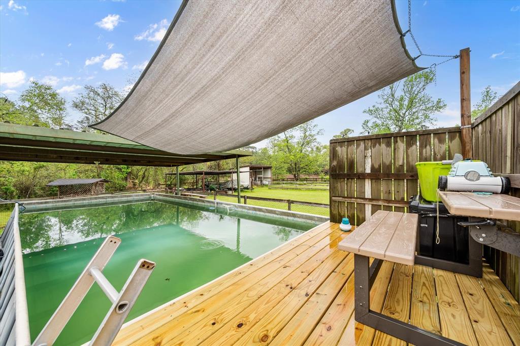 14036 Old Texaco Road Conroe, TX 77302 - Photo 34 of 40 View of dock with fence