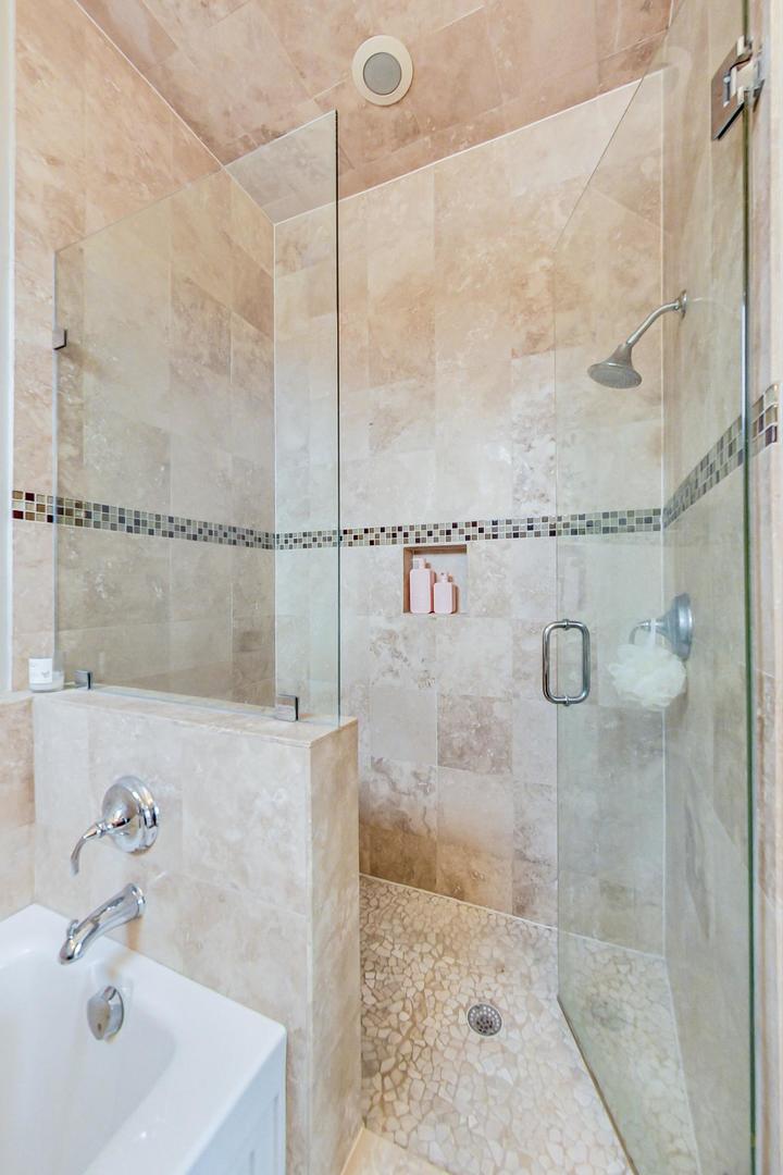 3605 South Leavitt Street, Unit 3 Chicago, IL 60609 - Photo 14 of 22 a bathroom with a shower and a sink