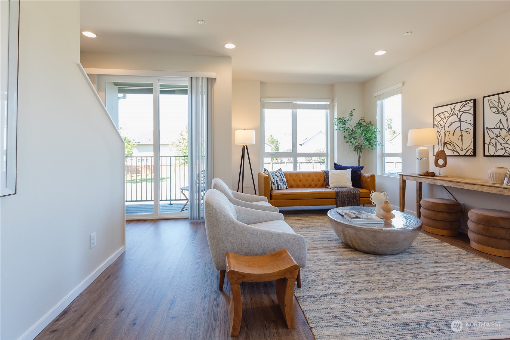 4226 148th Street Southeast, Unit C5 Bothell, WA 98012 - Photo 6 of 24 a living room with furniture and a wooden floor